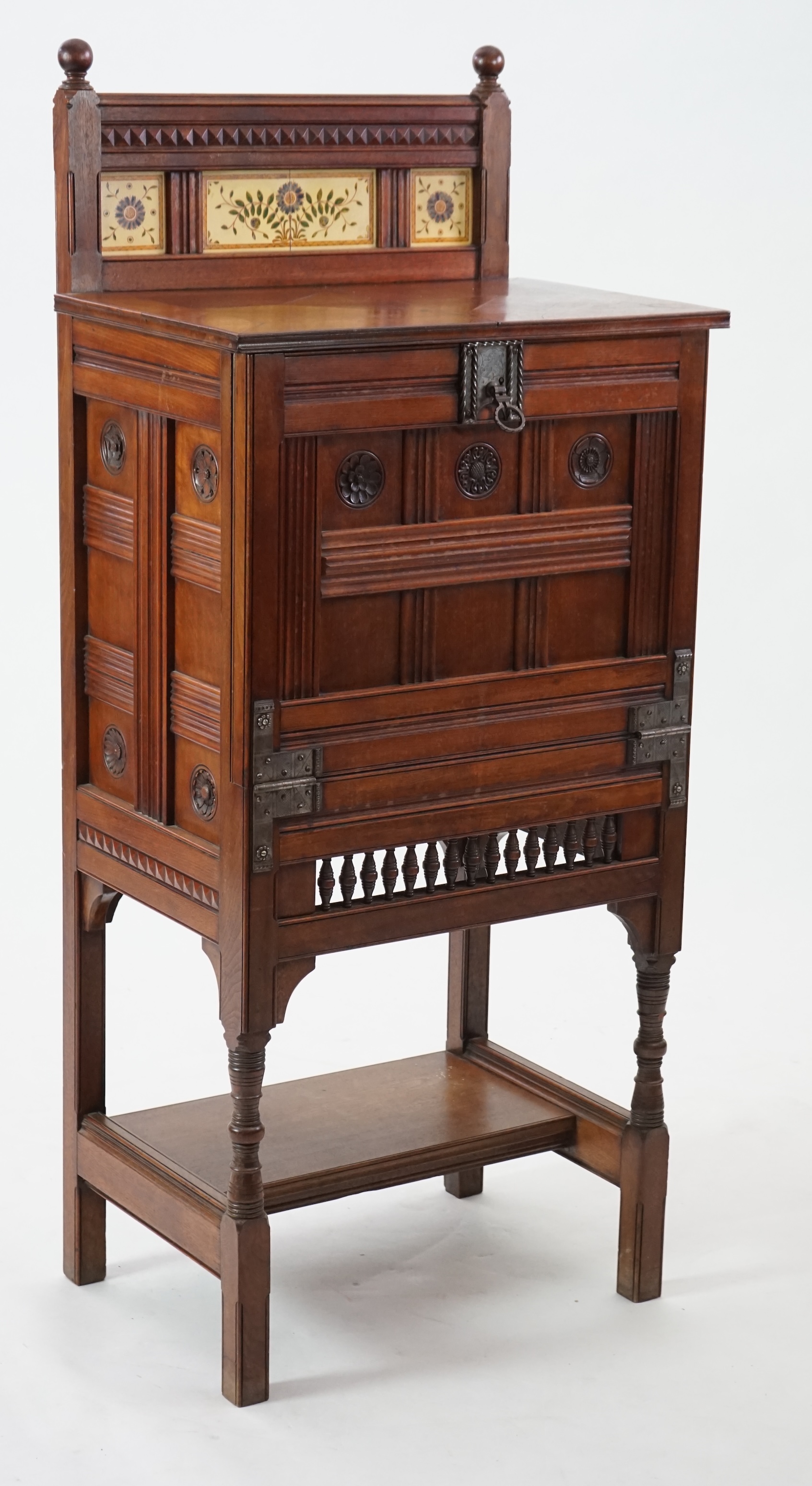 A Victorian Aesthetic Period walnut fall front desk attributed to Bruce James Talbert (1838-1881)